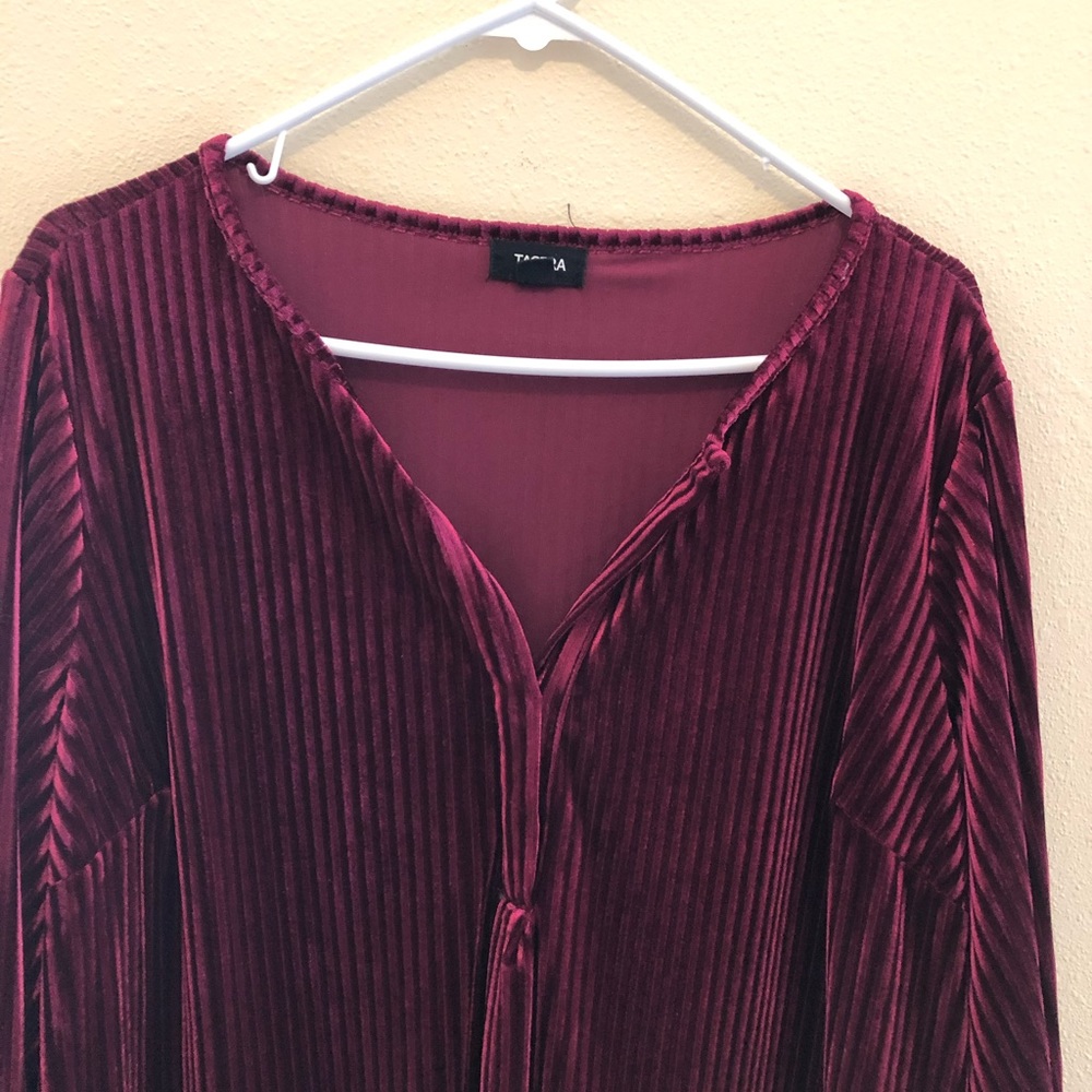 Knee length, velvet ruby red dress. Long sleeves. Love V neck with two buttons.